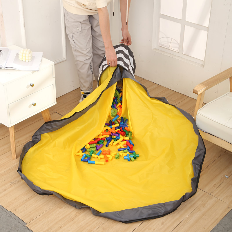Goodielicious ™ - ToyTidy: de speelmat en opberger in 1!